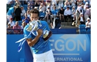 EASTBOURNE, ENGLAND - JUNE 21:  Feliciano Lopez of Spain celebrates with the trophy after beating Richard Gasquet of France during their Men's Singles Finals match on day eight of the Aegon International at Devonshire Park on June 21, 2014 in Eastbourne, England. (Photo by Jan Kruger/Getty Images)